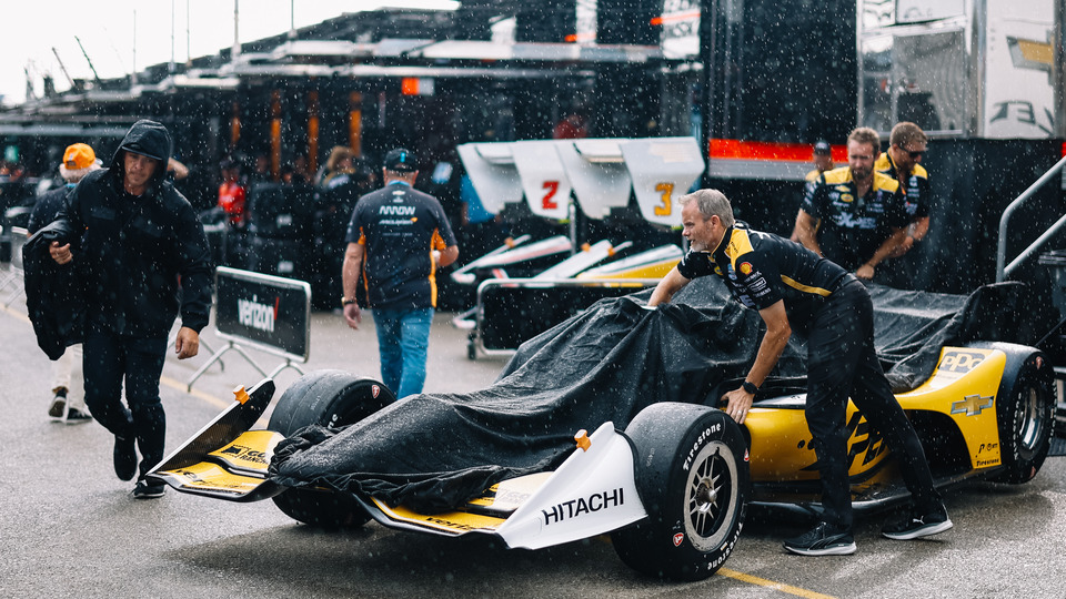 Scott McLaughlin's car is wheeled out in the rain